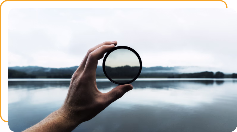 FOCUS THRU A CAMERA LENS - ORANGE BOX